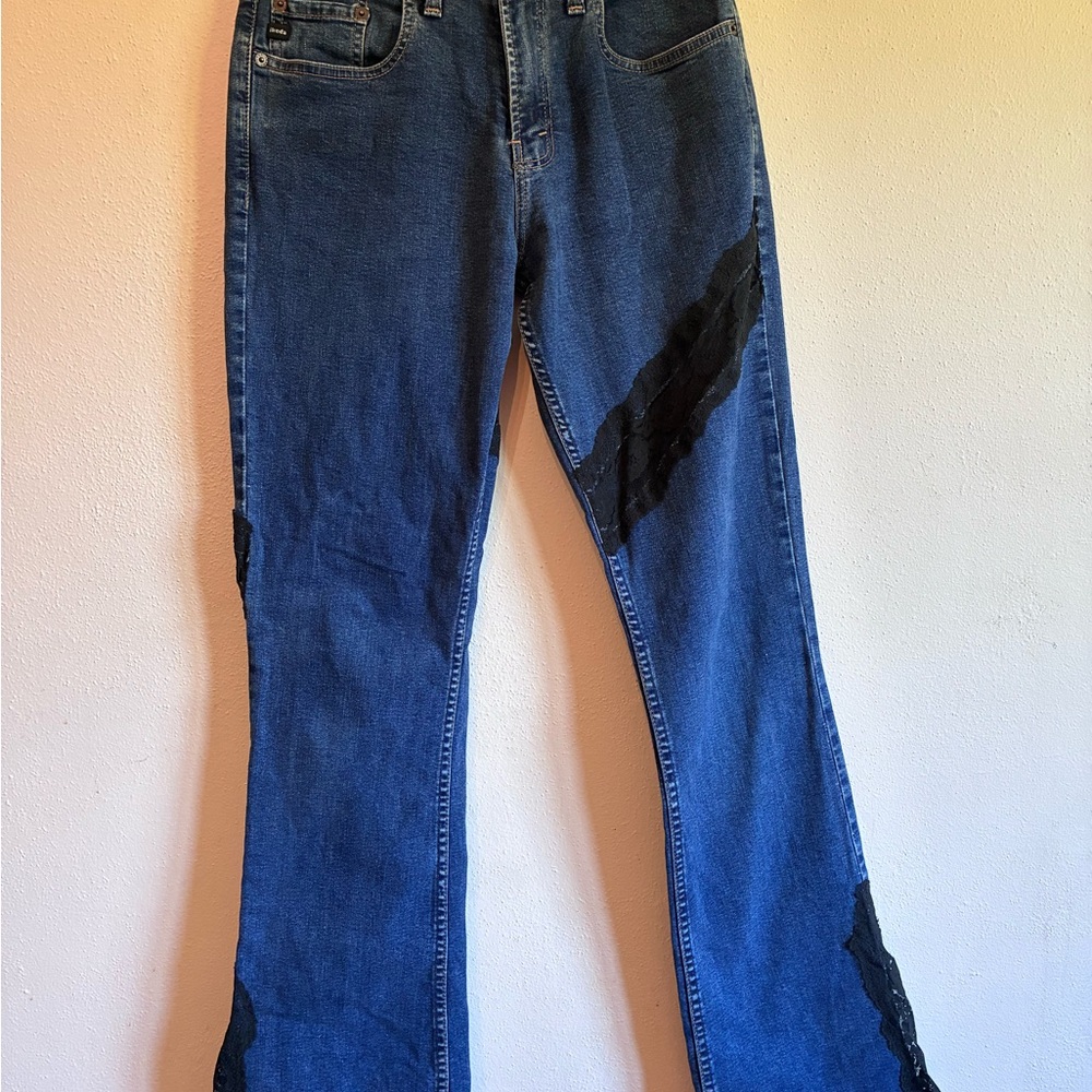 Stylish Blue Flare Jeans with Black Accents